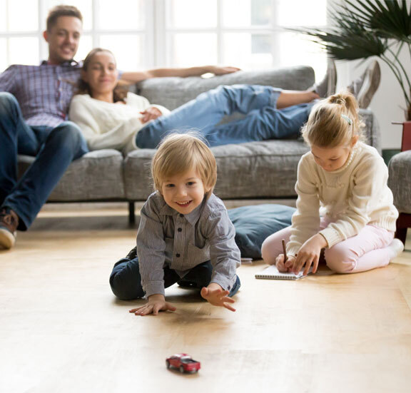 This image shows a family smiling.