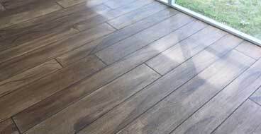 This image shows a floor that has a wood stain coating.