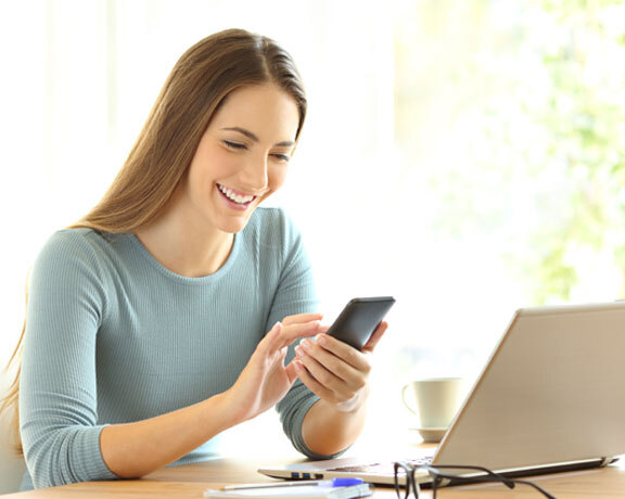 Basement concrete floor epoxy sealer This image shows a woman using her phone.