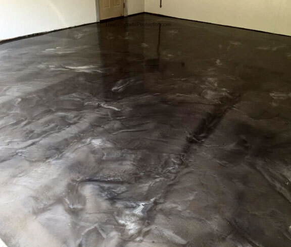This image shows a garage floor with epoxy painted floor.
