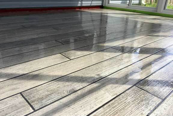 This image shows a floor that has a wood stain coating.