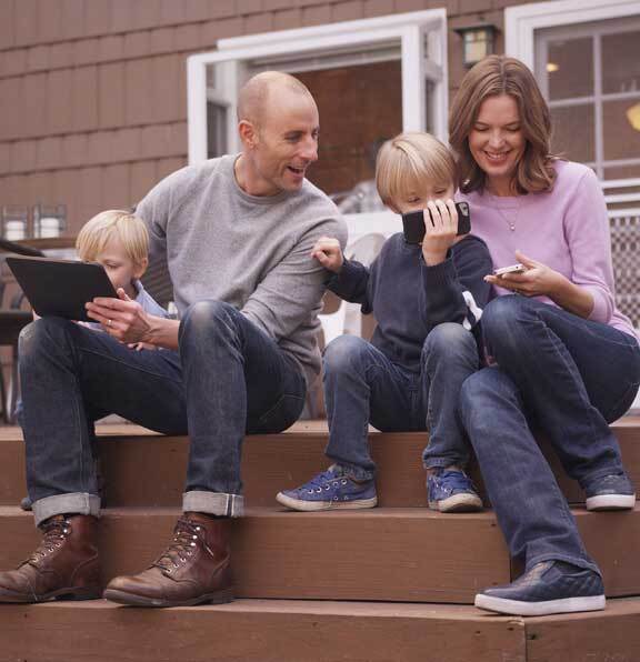 This image shows a family smiling.