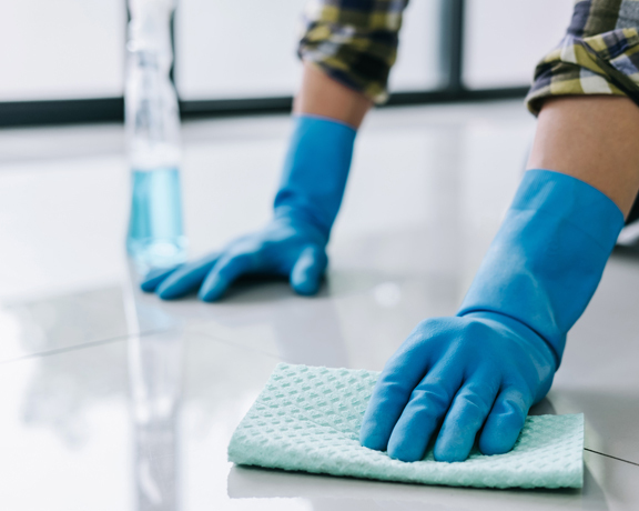 This image shows a man wiping the floor.