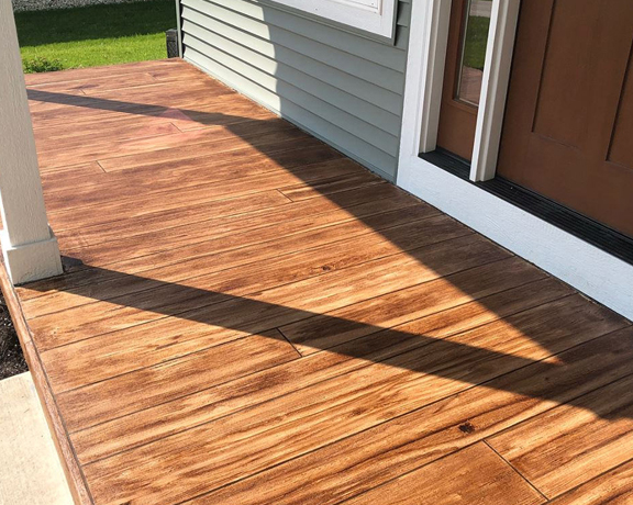 Rustic Wood Flooring Fort Wayne This image shows a floor that has a wood stain coating.