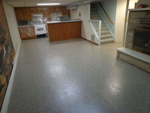 This image shows a Basement Floor with flake epoxy paint.
