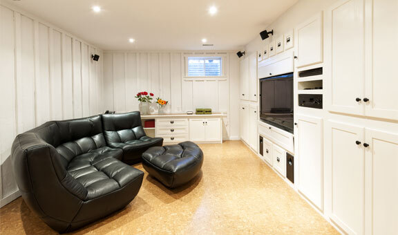 This image shows a Basement Floor with flake epoxy paint.