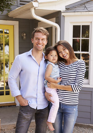 This image shows a family smiling.